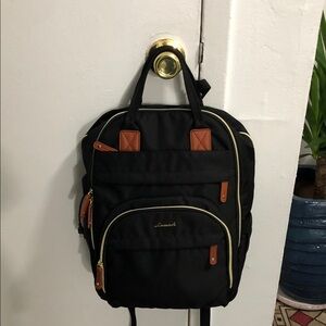 Black and Brown Backpack
18 H x 15 W